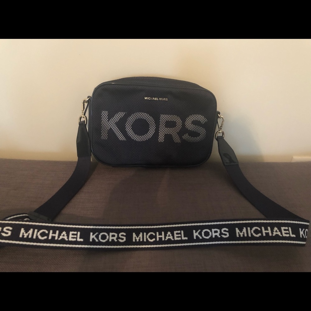 Medium dark blue michael kors bag white kors logo
